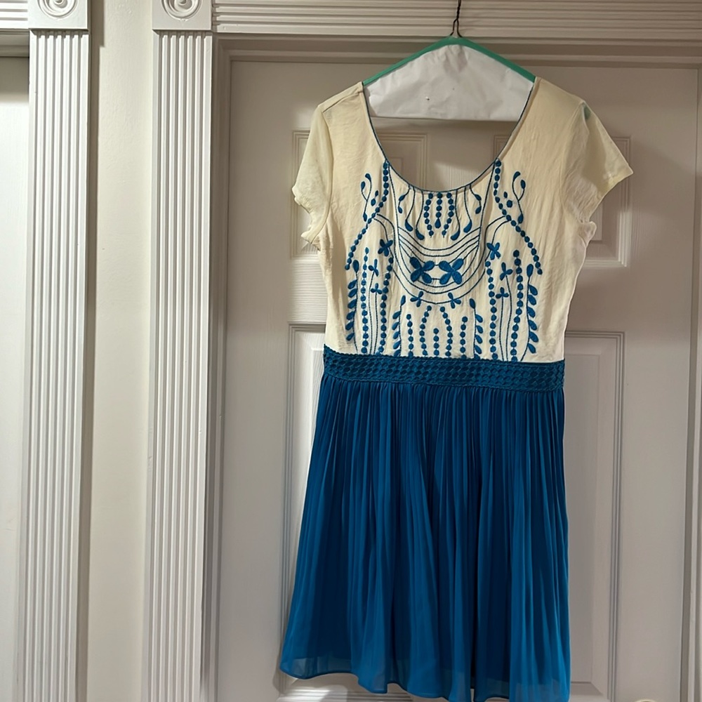 “mi a mi” embroidery dress too with pleated skirting on bottom. Never worn